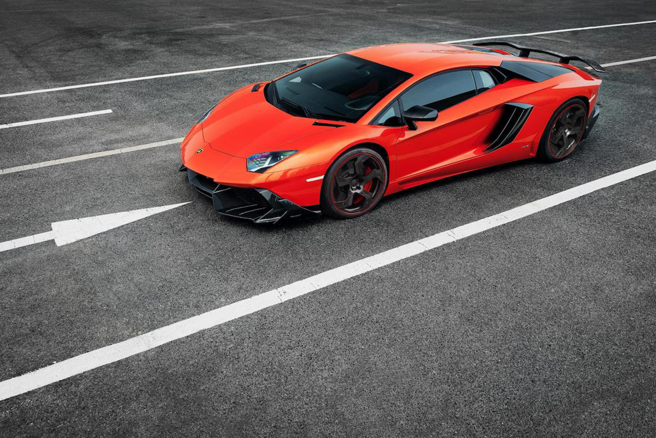 mansory aventador competition carbon fiber top front angle front bumper side skirt air intake fully forged wheel