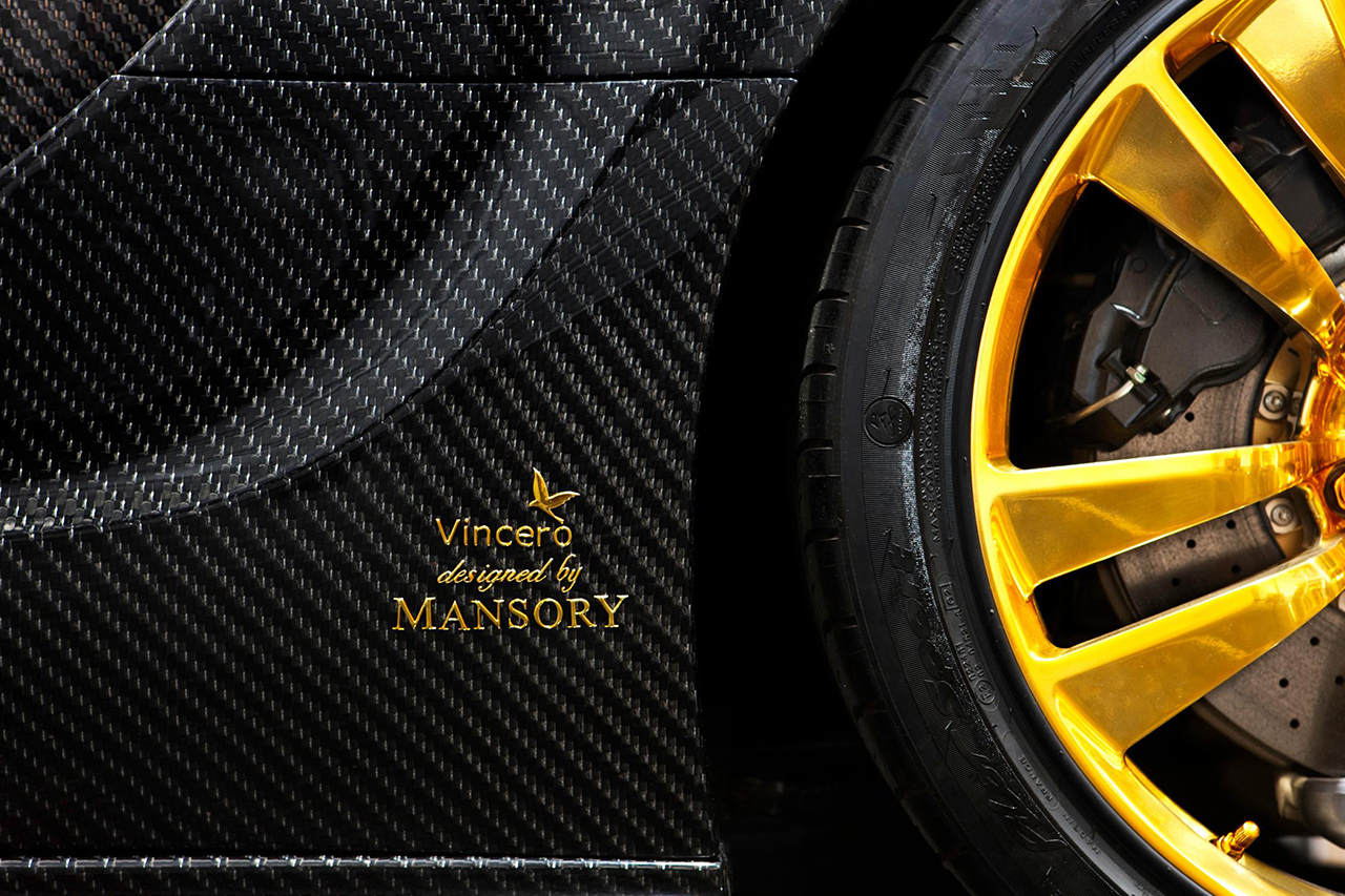 mansory bugatti veyron linea d'oro carbon fiber logo