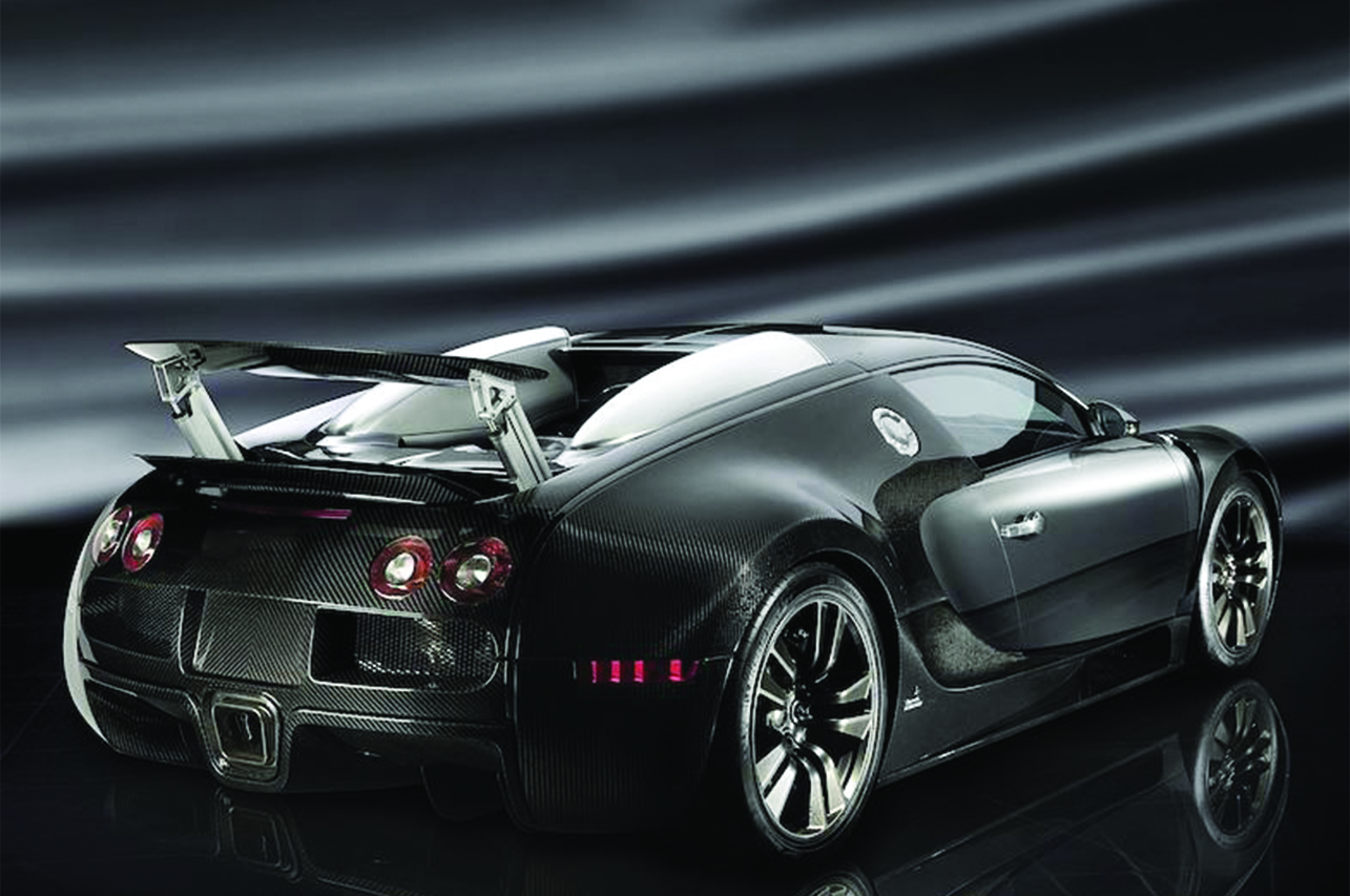 mansory bugatti veyron linea vincero rear angle wing up carbon fiber wide body